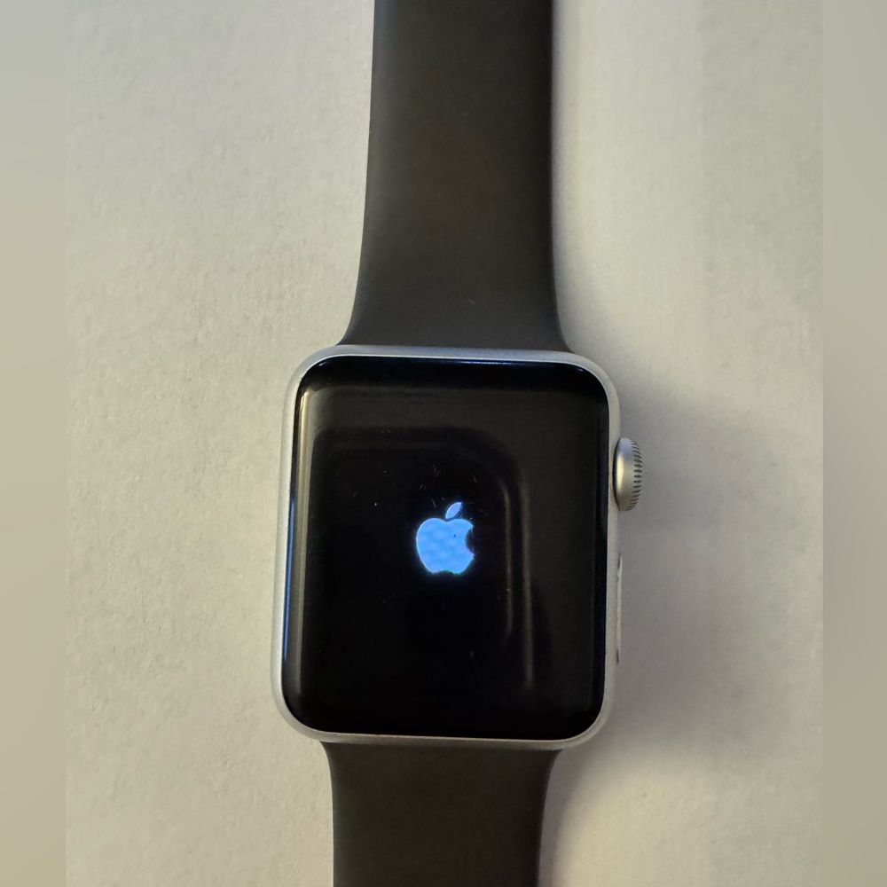 Apple Smartwatch with Black Band and Silver Case